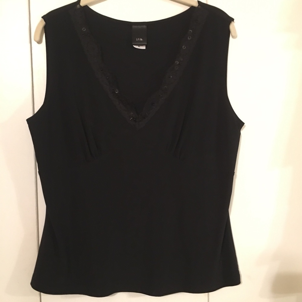 Sleeveless v neck top with lace trim and beads